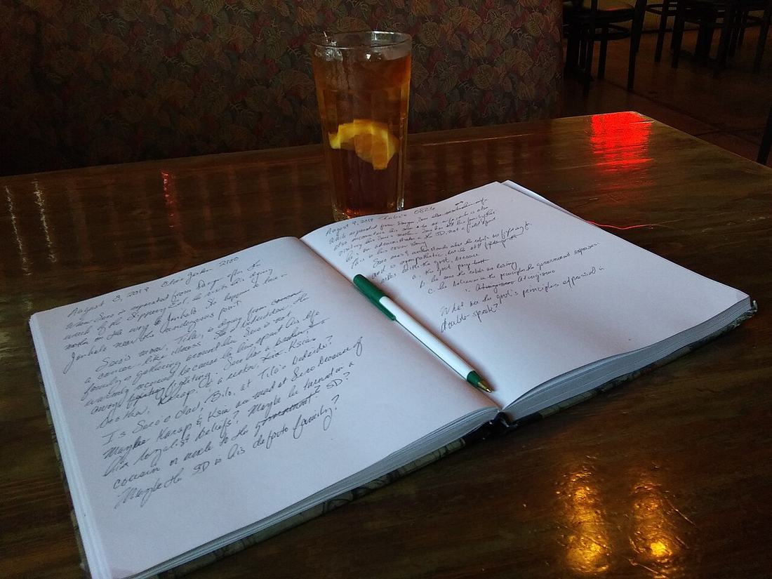 A notebook and pen